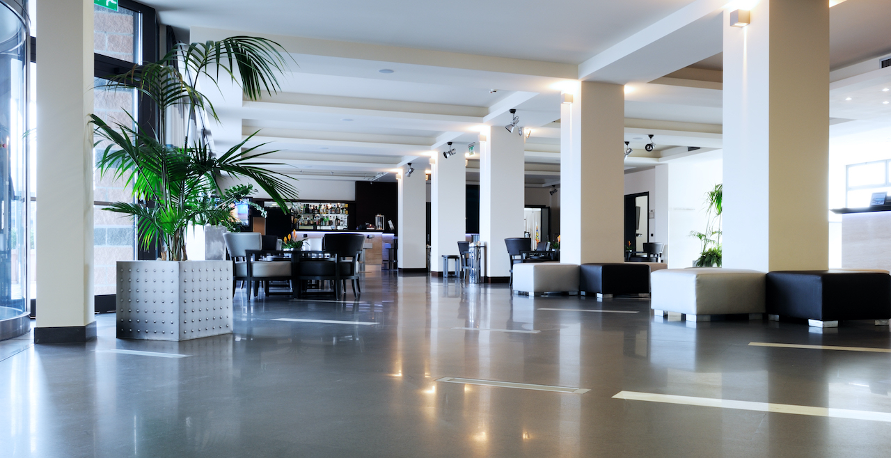 Resort and club lobby environment supporting guest registration and facility access